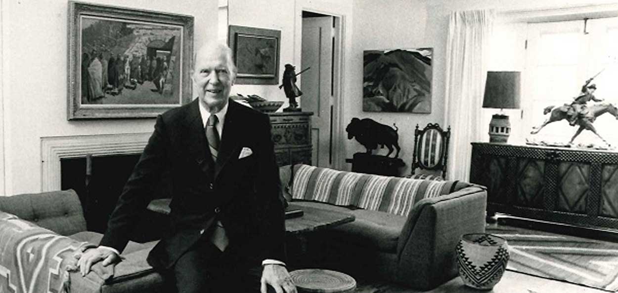 Harrison Eiteljorg posing in an office